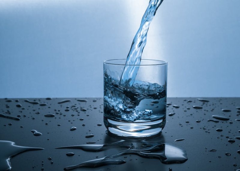 Pure water glass representing Shree Ram's mission